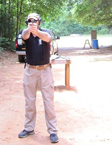 Instructor firing pistol